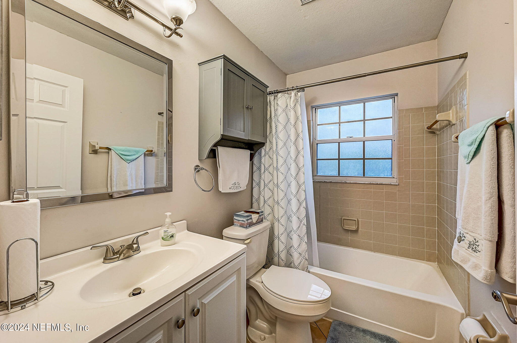 1130 Linwood Loop St. Johns, FL 32259 - Photo 26 of 34 a bathroom with a sink toilet and shower
