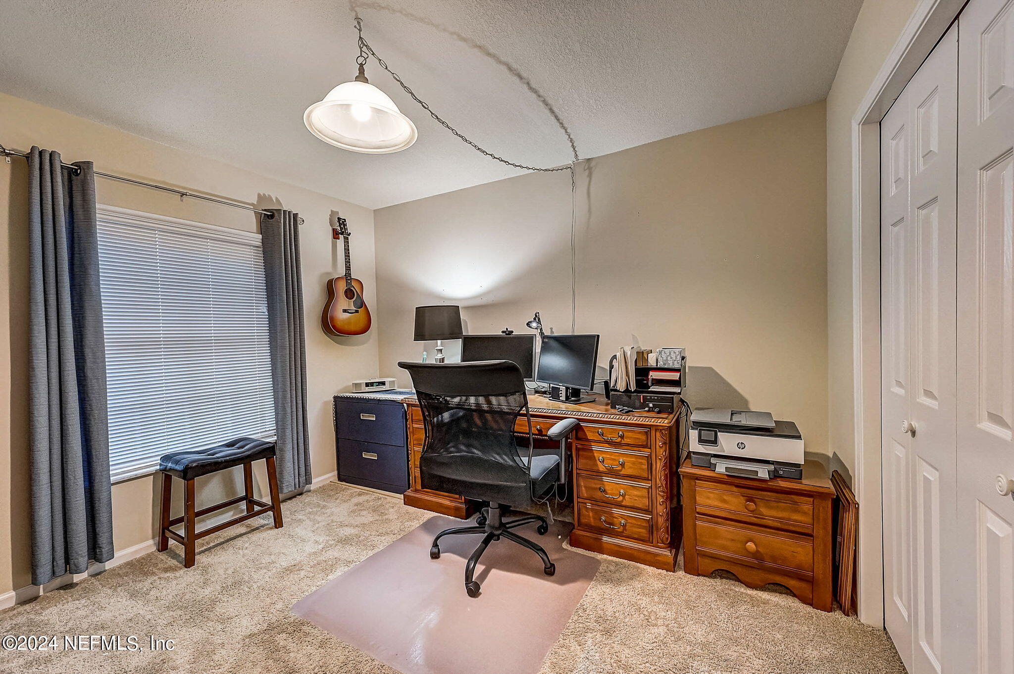 1130 Linwood Loop St. Johns, FL 32259 - Photo 27 of 34 a view of a workspace with furniture and a window