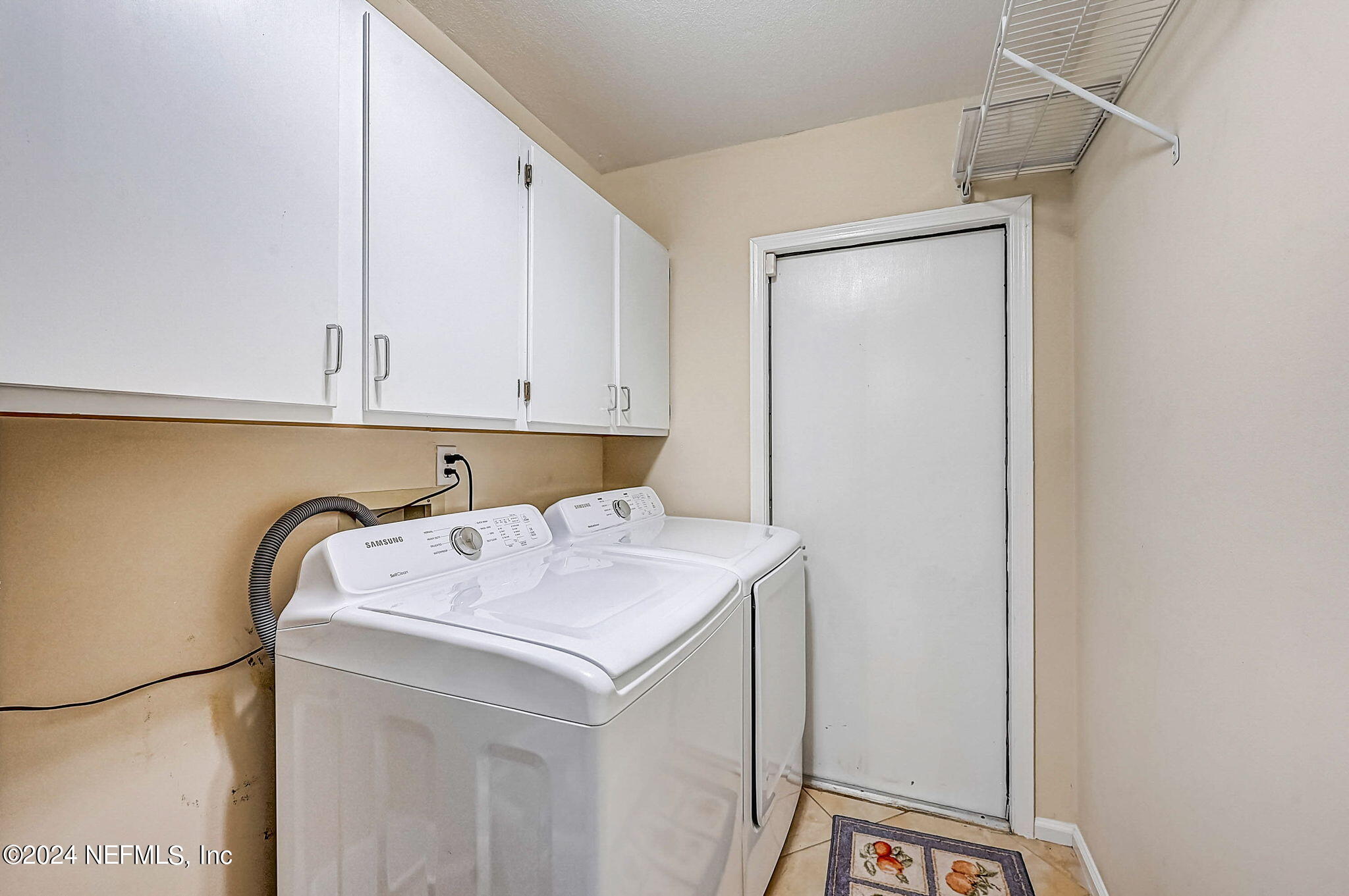 1130 Linwood Loop St. Johns, FL 32259 - Photo 31 of 34 a utility room with dryer and washer