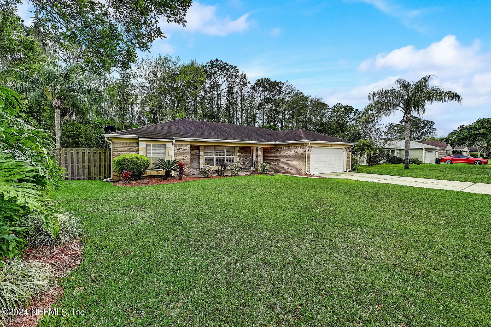 1130 Linwood Loop St. Johns, FL 32259 - Photo 34 of 34 a front view of a house with garden