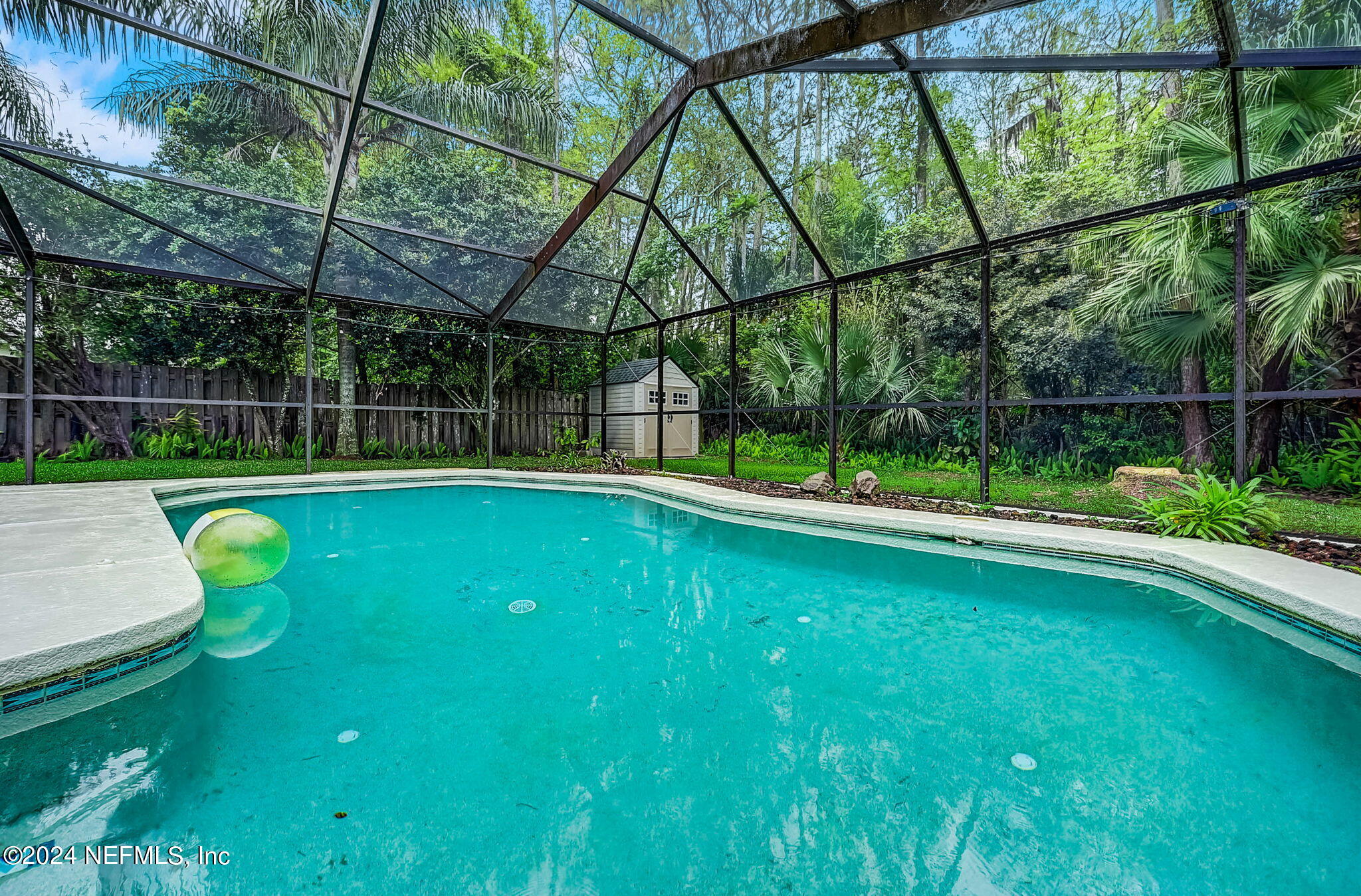 1130 Linwood Loop St. Johns, FL 32259 - Photo 8 of 34 a view of a backyard with swimming pool