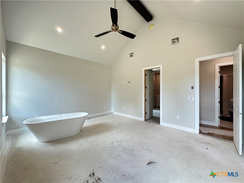 418 Dos Rios Drive Belton, TX 76513 - Photo 25 of 41 an empty room with a ceiling fan and bathroom