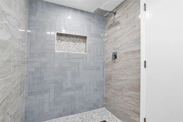 wooden floor with white walls