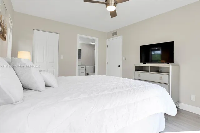 a parked cars parked in front of a house