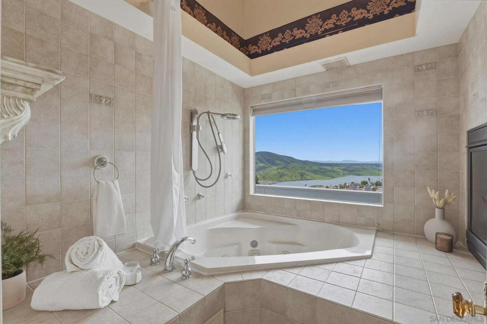 1650 Cuyamaca Avenue Spring Valley, CA 91977 - Photo 7 of 35 a bathroom with a tub and a shower