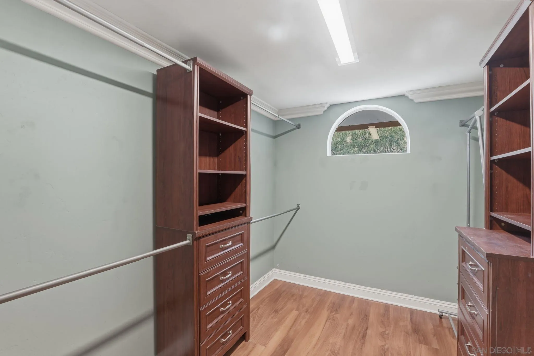 1650 Cuyamaca Avenue Spring Valley, CA 91977 - Photo 9 of 35 a view of walk in closet with clothes and shoes