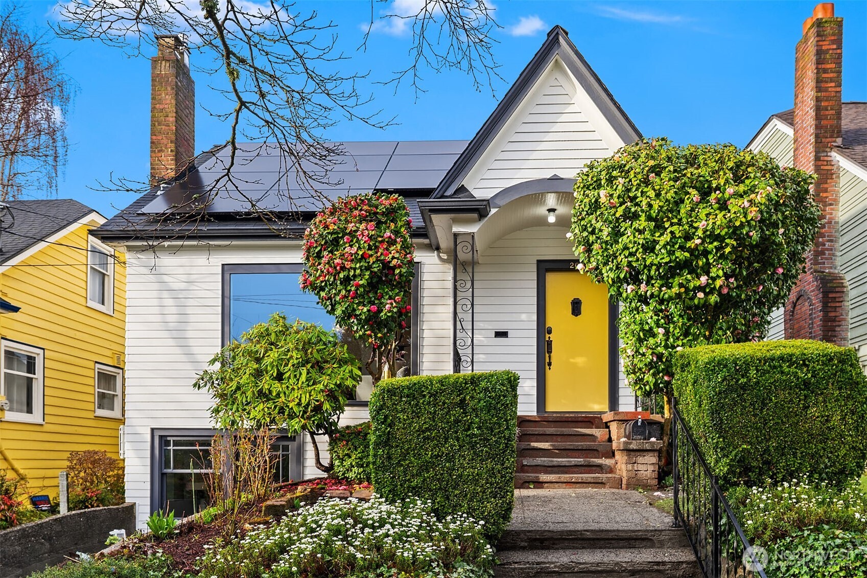 200 Northwest 73rd Street Seattle, WA 98117 - Photo 1 of 1 a front view of a house with garden
