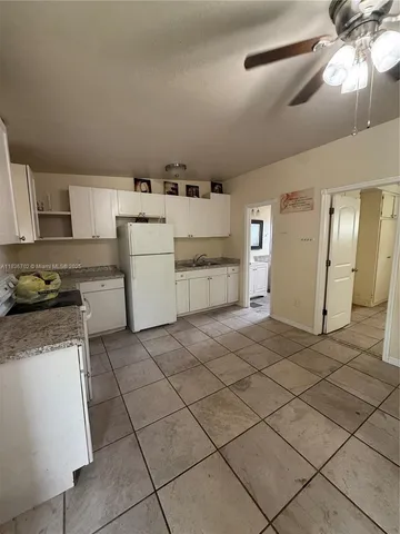 a kitchen with a cabinets and counter space