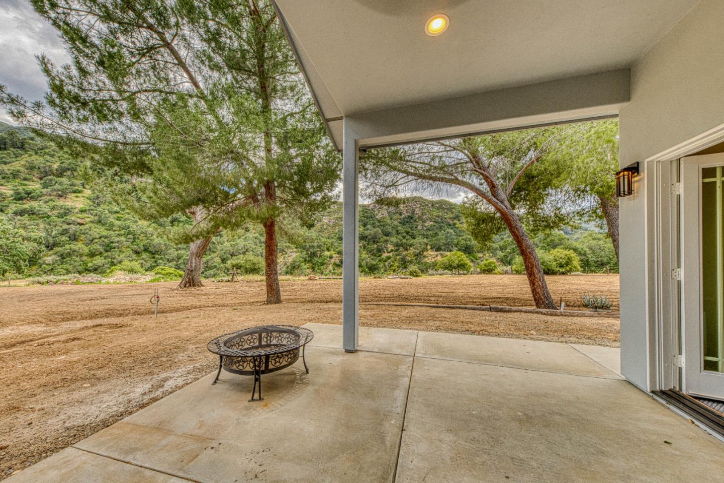 47317 Arroyo Seco Road Greenfield, CA 93927 - Photo 15 of 47 a bench sitting in middle of a yard