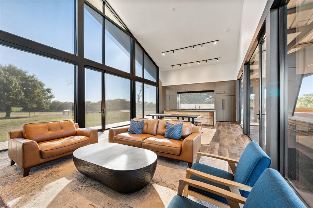 520 High Rdg Drive McKinney, TX 75071 - Photo 21 of 39 a living room with furniture and a large window