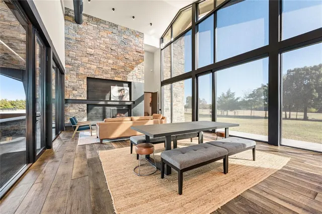 a kitchen with granite countertop a sink and a stove