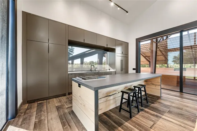a kitchen with a stove and a sink