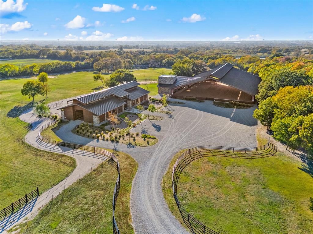520 High Rdg Drive McKinney, TX 75071 - Photo 3 of 39 an aerial view of a swimming pool with outdoor seating
