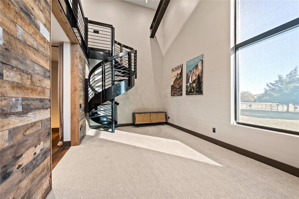 520 High Rdg Drive McKinney, TX 75071 - Photo 31 of 39 a view of a hallway with a window