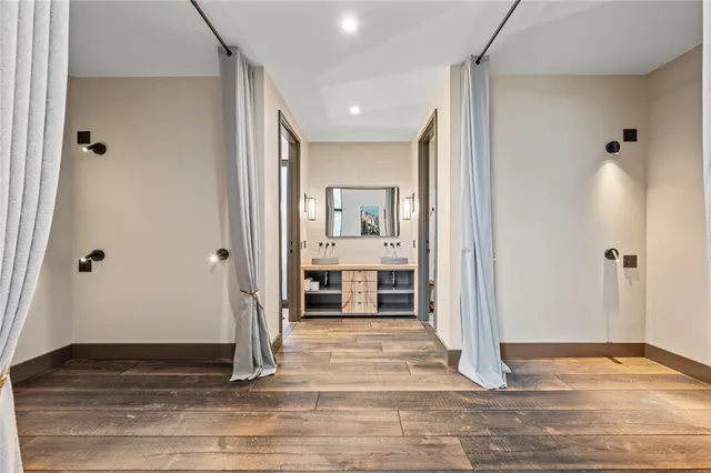 a bathroom with a toilet a sink and a shower