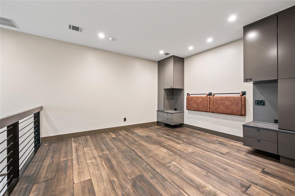 520 High Rdg Drive McKinney, TX 75071 - Photo 35 of 39 a view of room with entryway and wooden floor