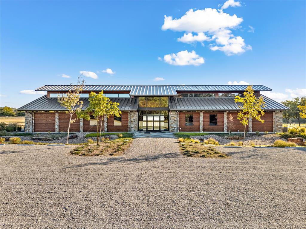 520 High Rdg Drive McKinney, TX 75071 - Photo 6 of 39 a front view of a house with basket ball court and outdoor seating
