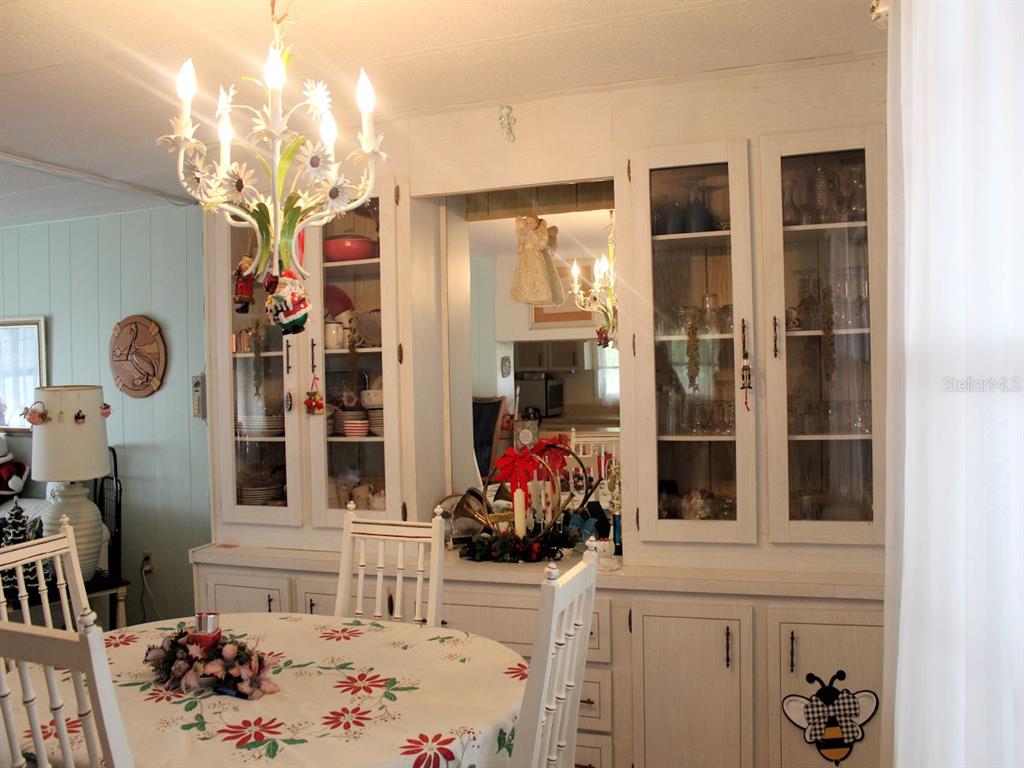 55 Thatch Palm Street West Largo, FL 33770 - Photo 4 of 14 a living room filled with furniture