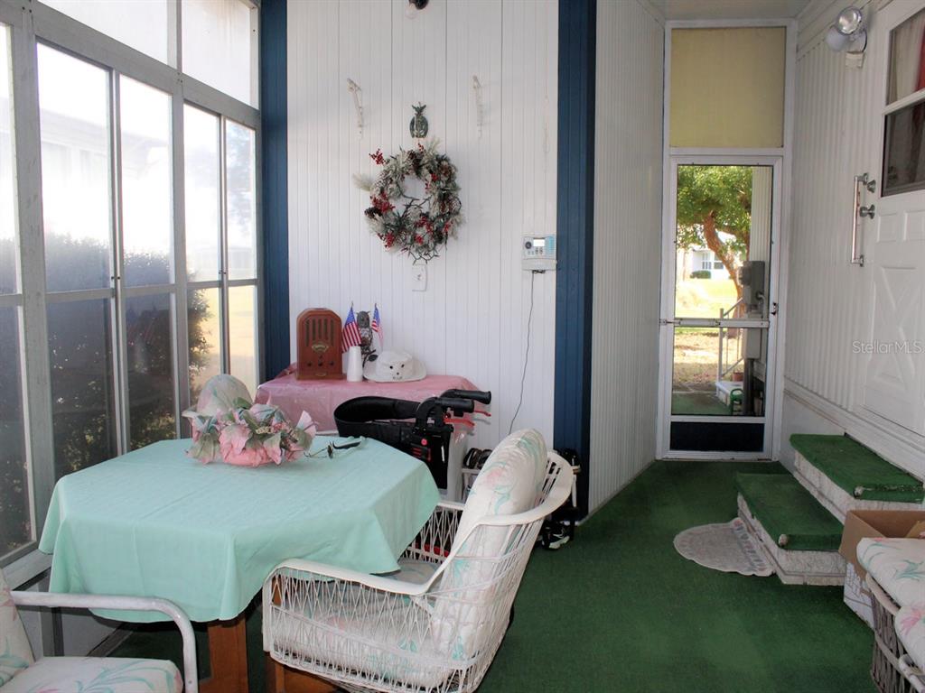 55 Thatch Palm Street West Largo, FL 33770 - Photo 9 of 14 a bedroom with a bed and a window