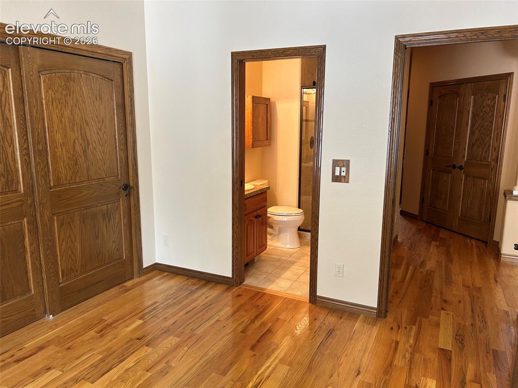 17990 Sawmill Road Colorado Springs, CO 80908 - Photo 16 of 40 Second bedroom or office on main level
