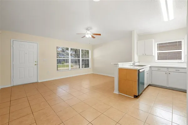 a view of a kitchen with furniture and a kitchen