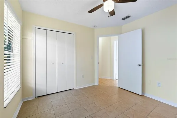 an entryway of a room with windows