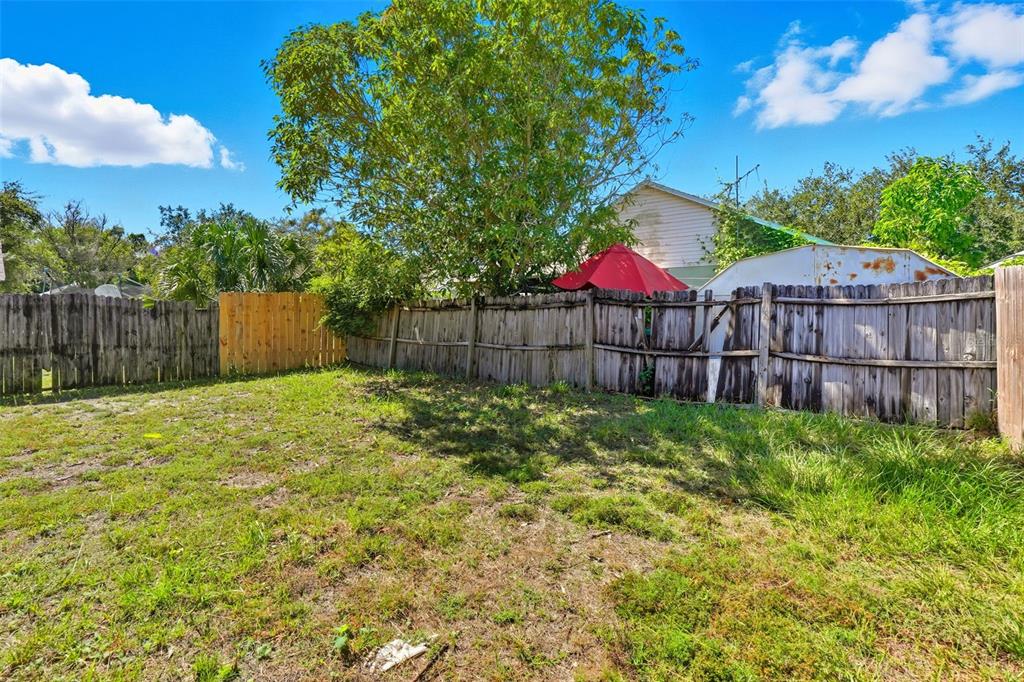1148 Golden Gate Avenue Orlando, FL 32808 - Photo 26 of 26 a view of a backyard