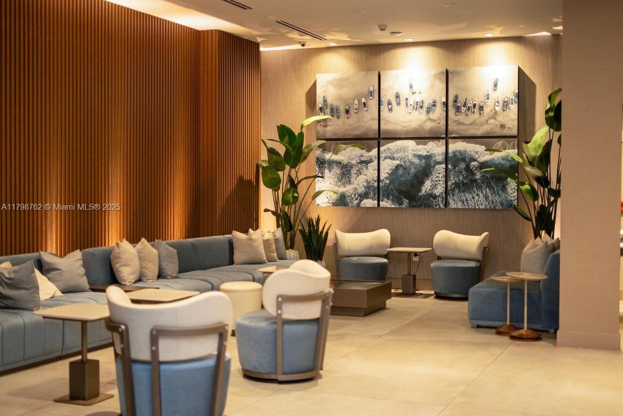 229 Southwest 9th Street, Unit 404 Miami, FL 33130 - Photo 6 of 11 a living room with furniture