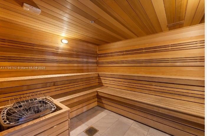 229 Southwest 9th Street, Unit 404 Miami, FL 33130 - Photo 8 of 11 a view of a room with wooden floor