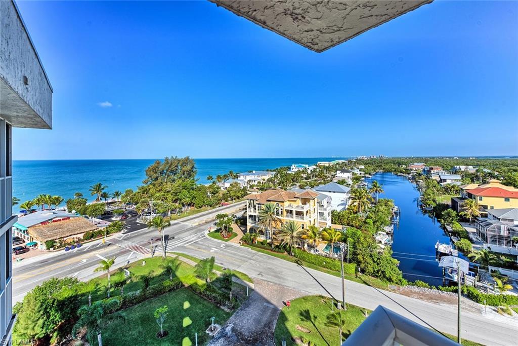 5900 Bonita Beach Road Southwest, Unit 1004 Bonita Springs, FL 34134 - Photo 4 of 27 a view of a city street with an ocean view