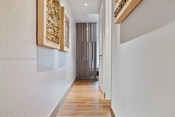 a view of a balcony with wooden floor