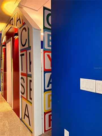 a view of a balcony with furniture and a window