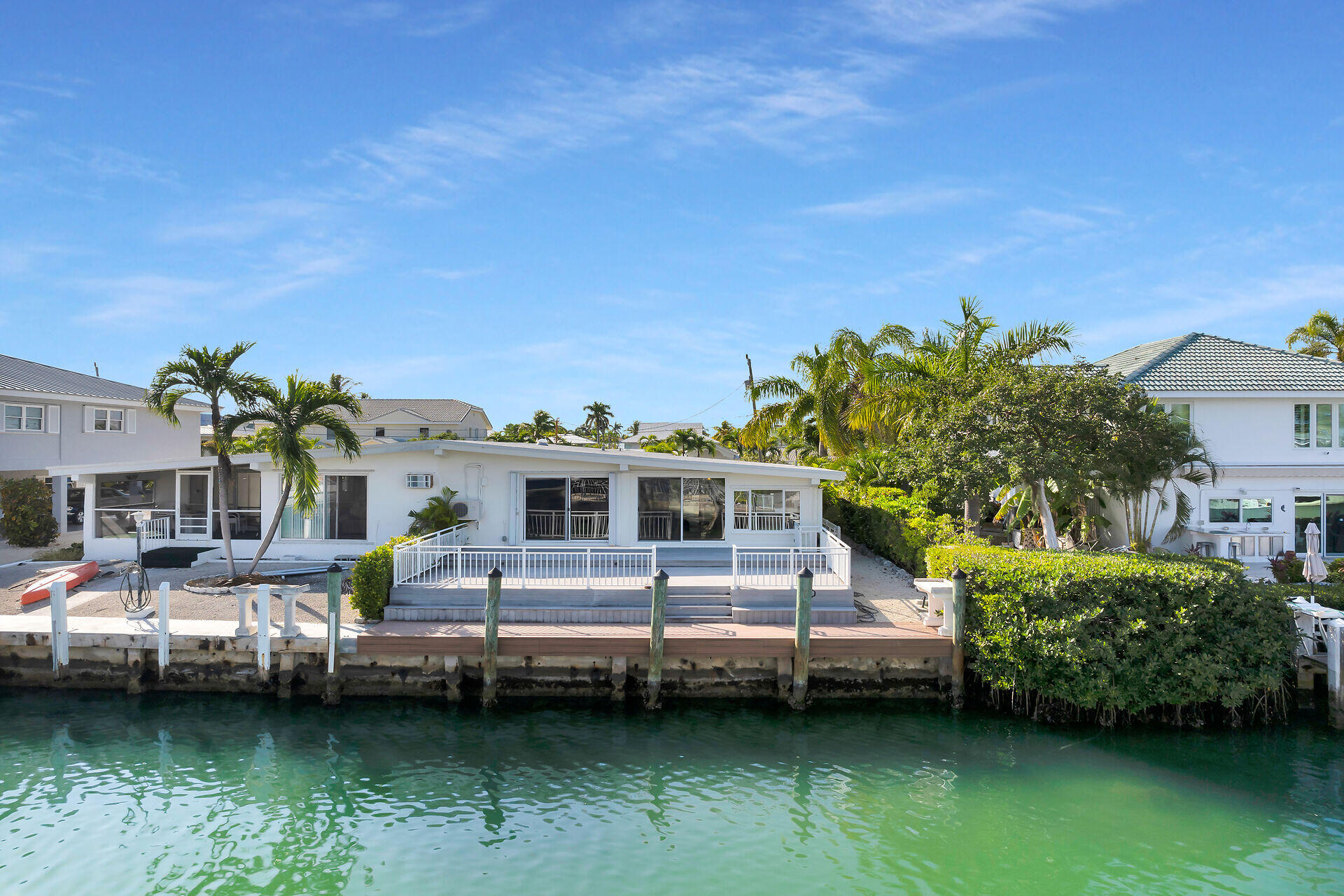 750 9th Street Key Colony Beach, FL 33051 - Photo 4 of 30 a view of a house with a garden and lake view