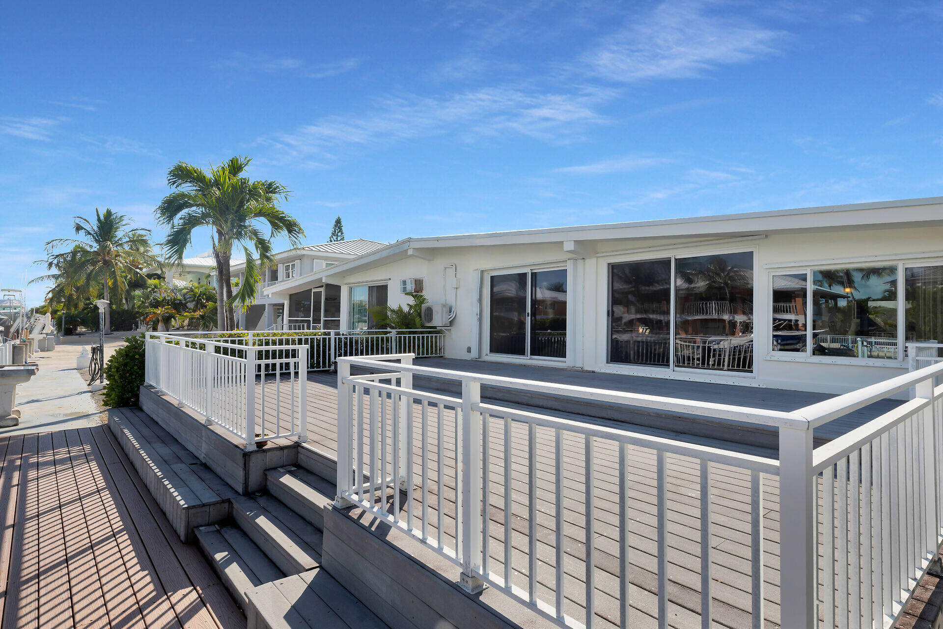 750 9th Street Key Colony Beach, FL 33051 - Photo 5 of 30 a view of a house with a deck