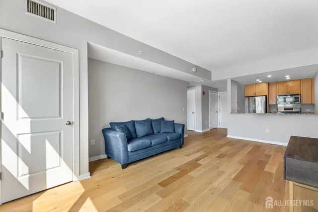 a bedroom with a bed and couch