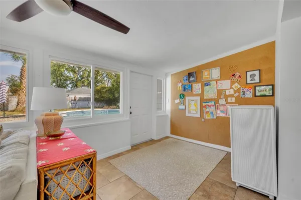 a living room with furniture and a window