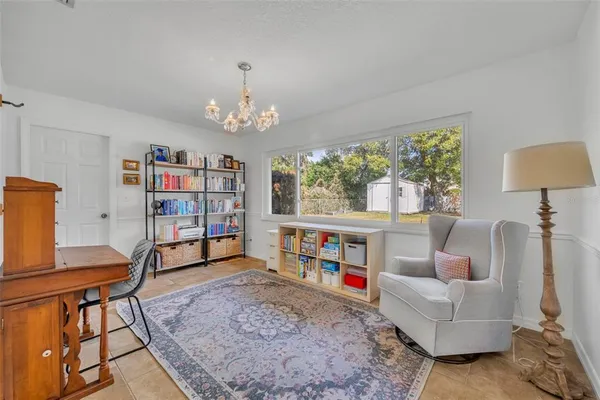 a living room with furniture and a window