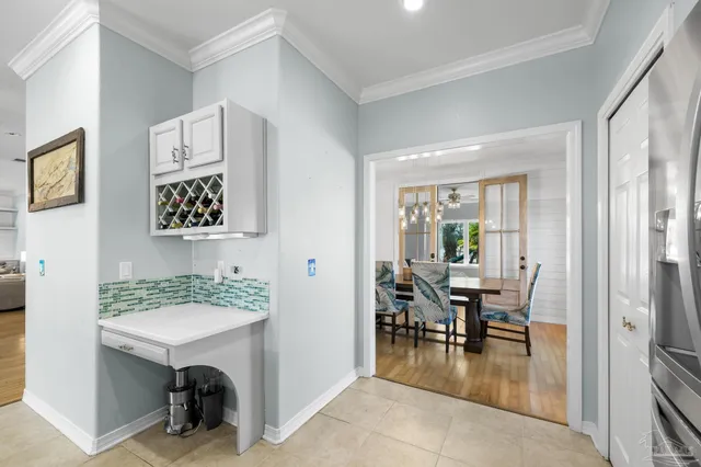 a view of a livingroom with furniture and windows