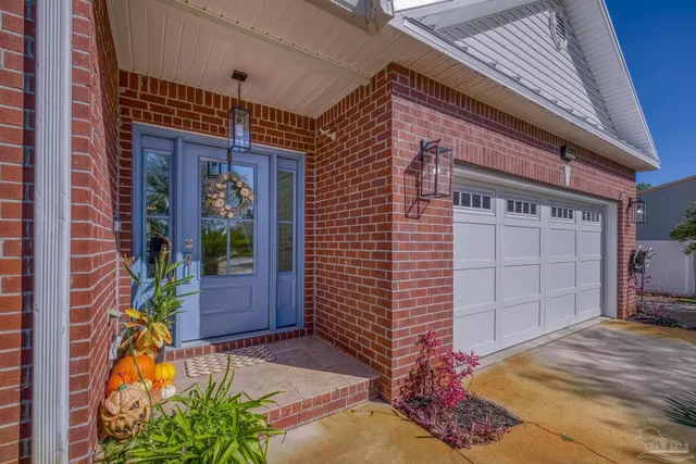 a view of a house with a garage