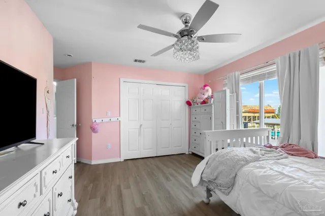 a kitchen with a stove and a refrigerator