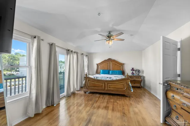 a kitchen with a stove and a refrigerator