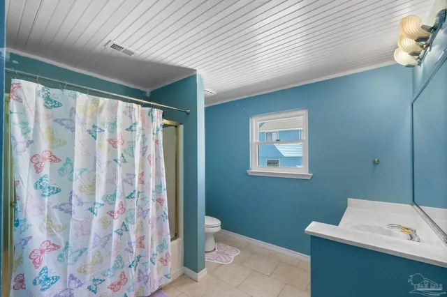 a view of balcony with couch and wooden floor