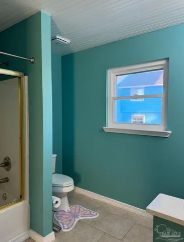 a view of balcony with wooden floor