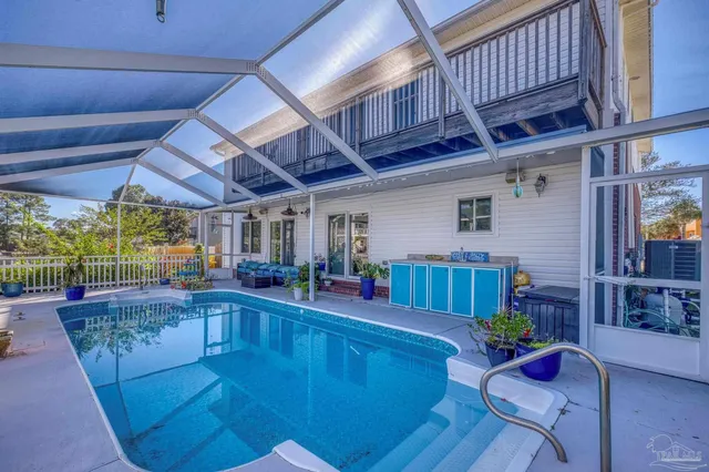 a picture of a bathroom with a shower