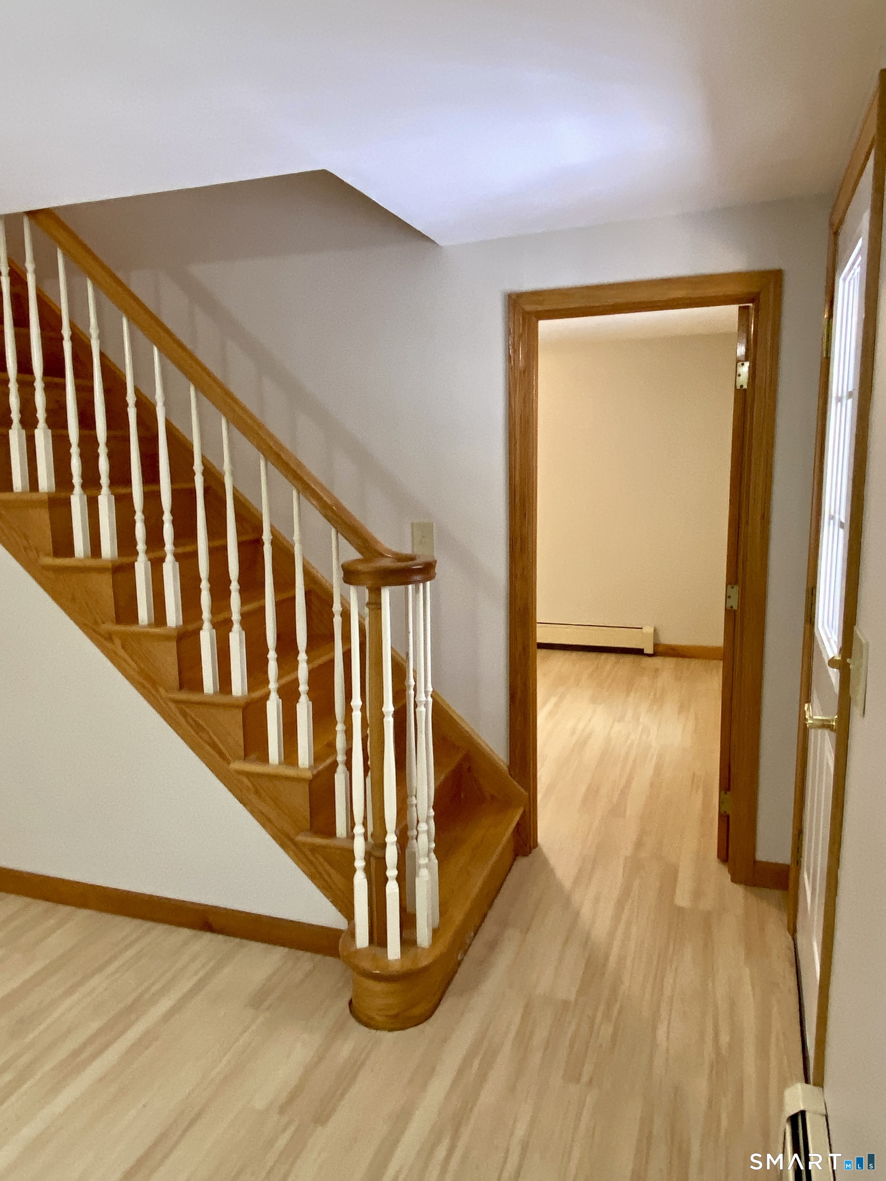 8 S Road Ellington, CT 06029 - Photo 15 of 21 a view of entryway with wooden floor