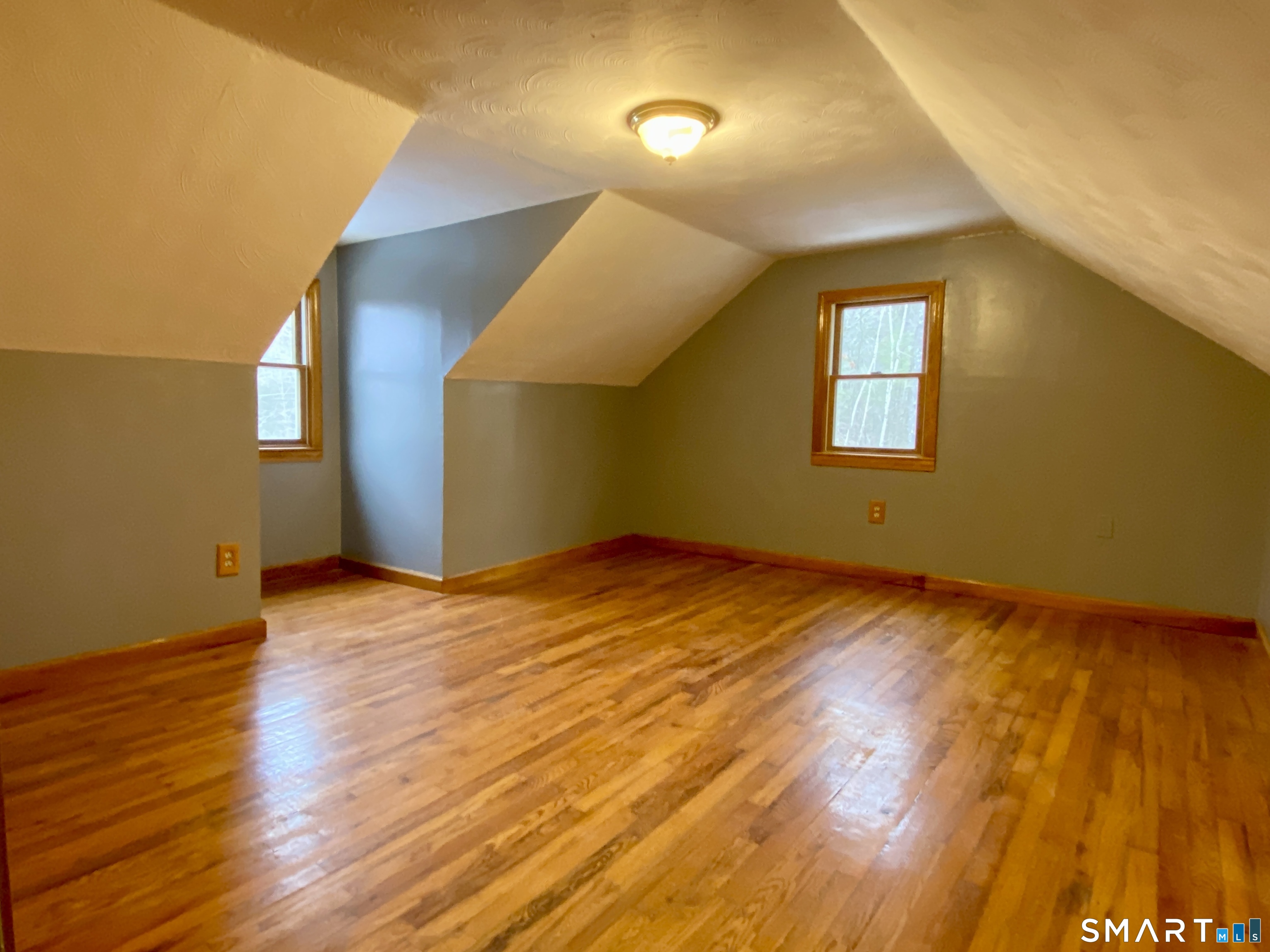 8 S Road Ellington, CT 06029 - Photo 16 of 21 a view of empty room with wooden floor