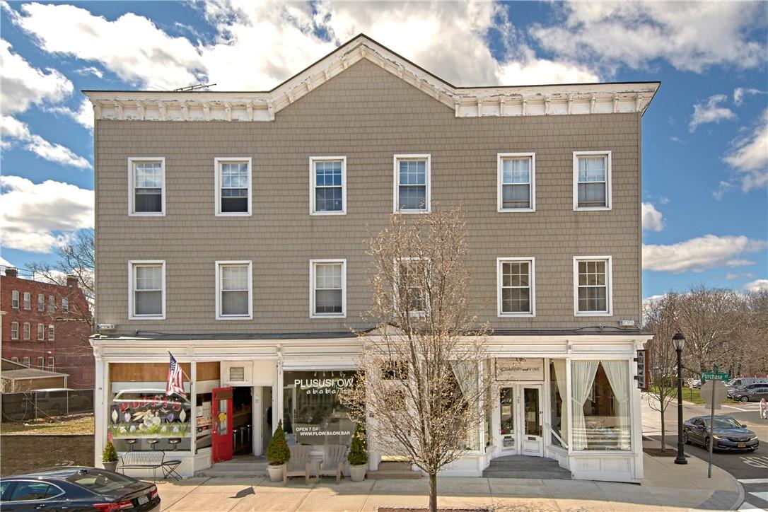 a front view of a building with street