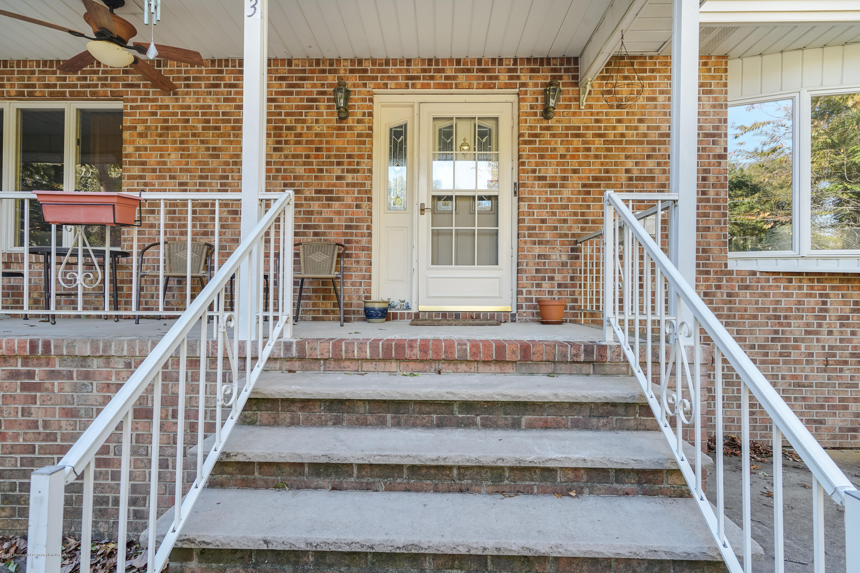 43 Korman Road Bayville, NJ 08721 - Photo 2 of 47 a view of a balcony with wooden floor and fence