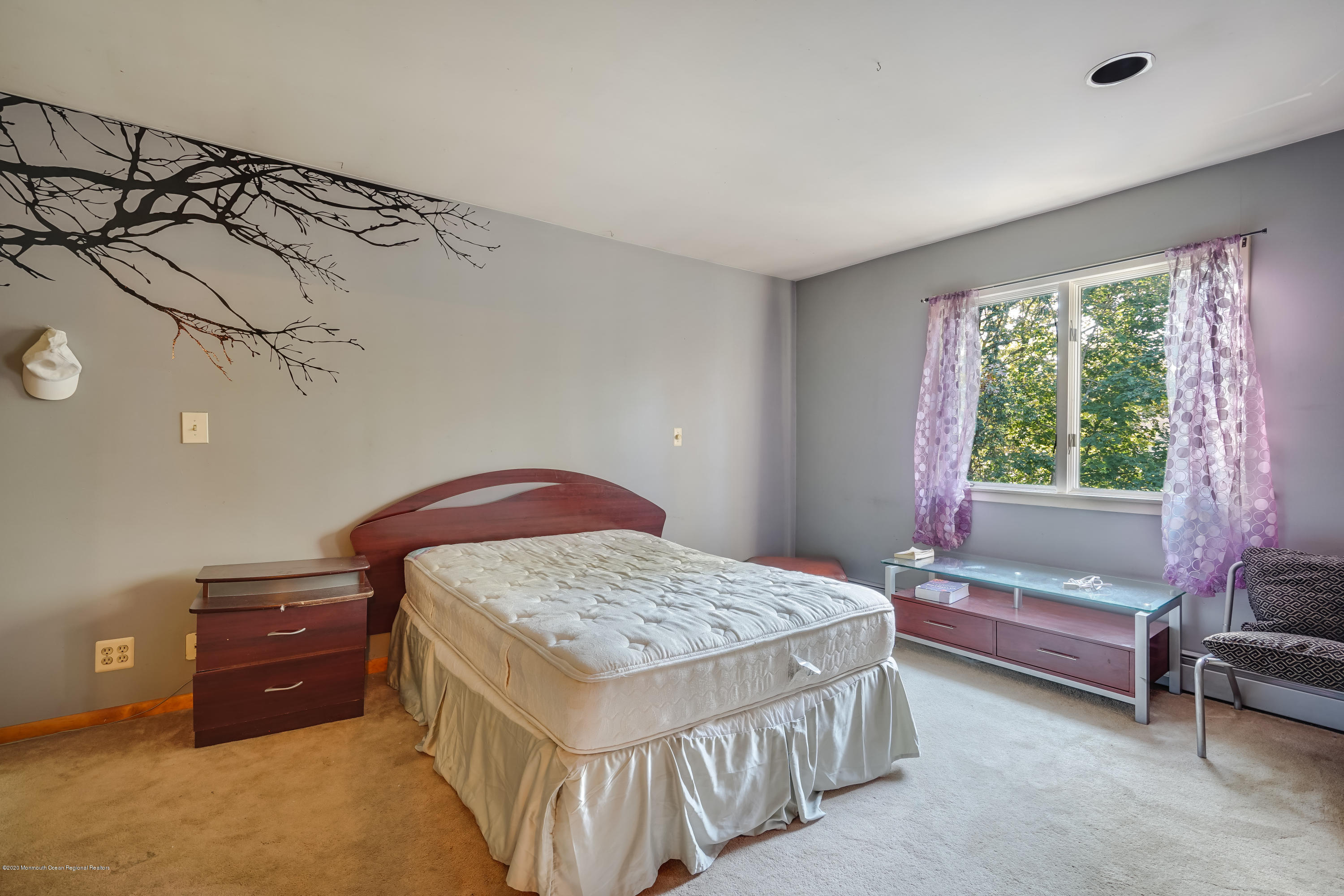 43 Korman Road Bayville, NJ 08721 - Photo 28 of 47 a bedroom with a bed and a dresser