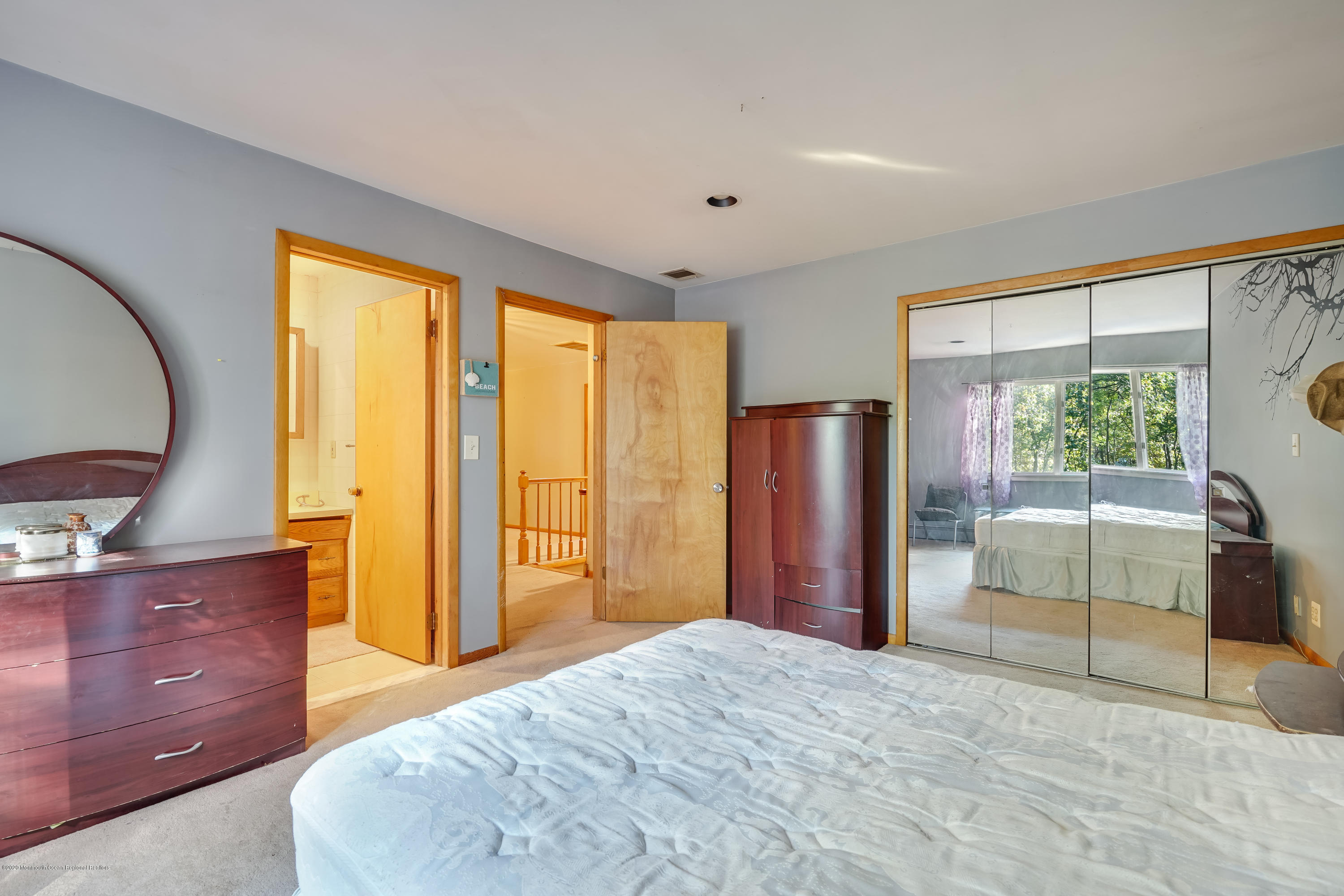 43 Korman Road Bayville, NJ 08721 - Photo 29 of 47 a bedroom with a bed and a dresser
